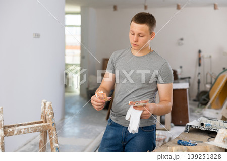 Fifteen-year-old teenager counting the first salary Fifteen-year-old teenager counting the first salary 139251828