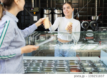 Young woman works as bartender and sells bubble tea 139251837
