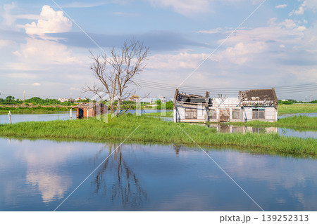 Abandoned Houses in Flooded Fields in Donggang, Chiayi, Taiwan Abandoned Houses in Flooded Fields in Donggang, Chiayi, Taiwan 139252313
