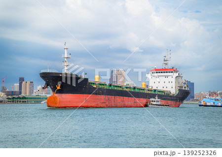 Cargo Ship Sailing in Kaohsiung Harbor, Taiwan Cargo Ship Sailing in Kaohsiung Harbor, Taiwan 139252326