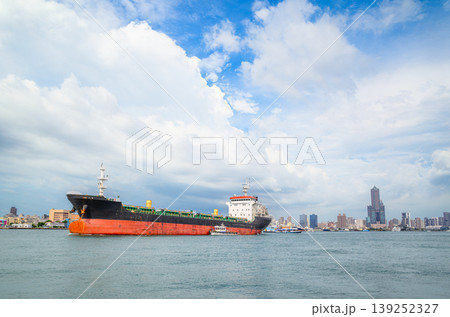 Cargo Ship Sailing in Kaohsiung Harbor, Taiwan Cargo Ship Sailing in Kaohsiung Harbor, Taiwan 139252327
