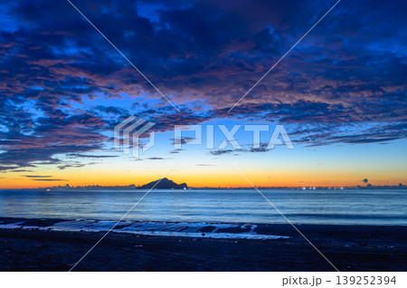 Sunrise over Guishan Island in Zhuangwei, Yilan, Taiwan Sunrise over Guishan Island in Zhuangwei, Yilan, Taiwan 139252394