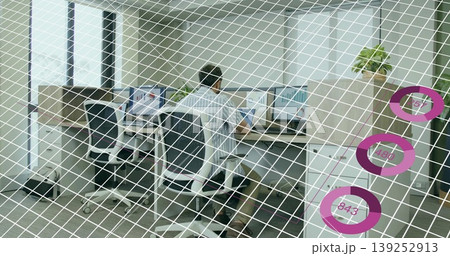 Man in striped shirt monitoring three monitors in open office, grid and purple overlays, copy space Man in striped shirt monitoring three monitors in open office, grid and purple overlays, copy space 139252913
