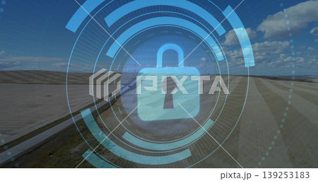Displaying central padlock icon securing rural farmland via digital interface, binary code overlay Displaying central padlock icon securing rural farmland via digital interface, binary code overlay 139253183