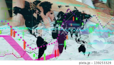 Hands holding pen and analyzing financial documents at office desk, with map overlay and charts Hands holding pen and analyzing financial documents at office desk, with map overlay and charts 139253329