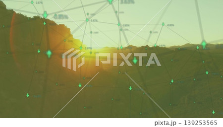 Displaying network graph overlaying valley at sunset, with green nodes and downward arrows 139253565
