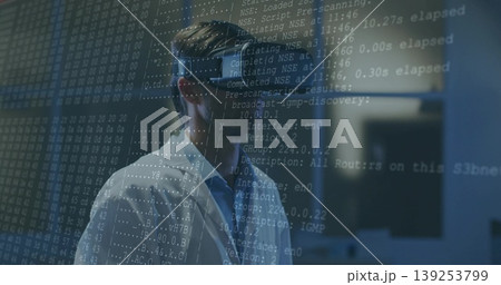 Analyzing scientist wearing white lab coat and VR headset in tech lab, with projected code lines Analyzing scientist wearing white lab coat and VR headset in tech lab, with projected code lines 139253799