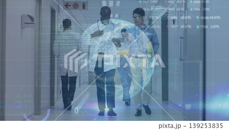 Walking team checking smartphone under globe with charts in hospital corridor, with stethoscope 139253835