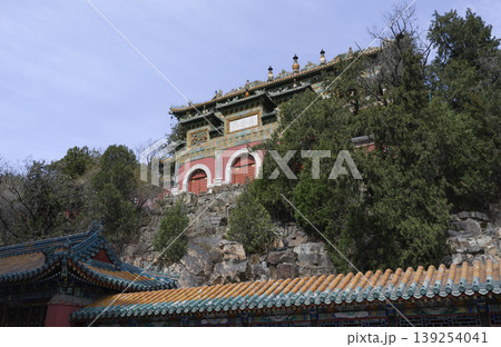 Building among the stones of ancient Buddhist Foxiange Temple in Yiheyuan Park in Beijing, China 139254041