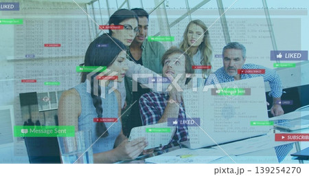 Collaborating team of six analyzing code overlays on laptop in glass-walled office, with smartphone 139254270