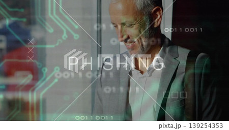 Glancing senior businessman in grey suit in office lobby, with phishing graphic, copy space 139254353