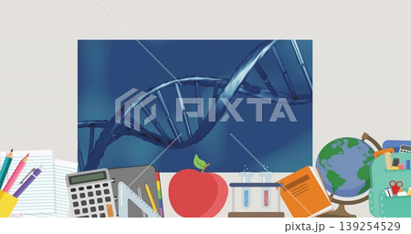 Displaying double-helix DNA graphic at classroom desk, with colored pencils, calculator, glassware 139254529