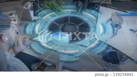 Projecting holographic interface above workstation, with laptop, monitor and robotic arm mount 139254891