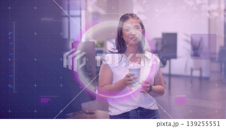 Holding paper coffee cup, employee wearing white blouse standing in open office, with HUD overlay Holding paper coffee cup, employee wearing white blouse standing in open office, with HUD overlay 139255551