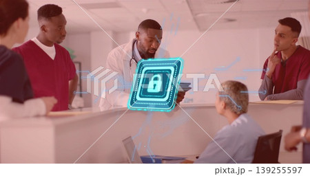 Holding tablet doctor in white coat reviewing data at hospital nursing station, with padlock icon Holding tablet doctor in white coat reviewing data at hospital nursing station, with padlock icon 139255597