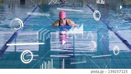 Swimming mature athlete performing breaststroke in lap pool, with pink swim cap and data overlays Swimming mature athlete performing breaststroke in lap pool, with pink swim cap and data overlays 139257125