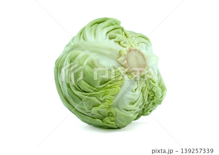 Fresh green cabbage head with a clean cut stem on a white background Fresh green cabbage head with a clean cut stem on a white background 139257339