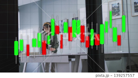 Cleaning woman wiping table in office, with candlestick chart overlay, spray bottle and cloth Cleaning woman wiping table in office, with candlestick chart overlay, spray bottle and cloth 139257557