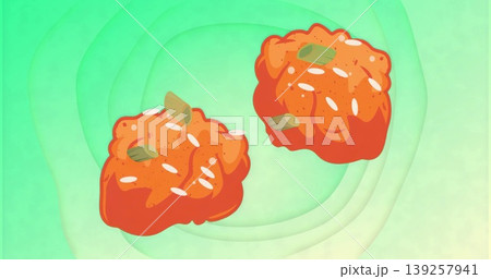 Floating two crispy orange food pieces on layered green backdrop, with sesame seeds and green onion Floating two crispy orange food pieces on layered green backdrop, with sesame seeds and green onion 139257941