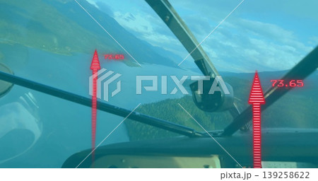 Showing cockpit frame and panel edge with struts over mountain lake, with HUD arrows labeled 73 139258622