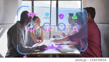 Collaborating five professionals leaning over table in meeting booth, with holographic interface Collaborating five professionals leaning over table in meeting booth, with holographic interface 139258638