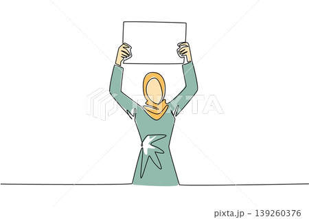 Unique colorful one line drawing depicts a young Muslim woman in hijab raising a blank marketing board up high. It represents an equality concept perfectly suited for a global female rights banner. 139260376