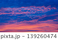Beautiful sunset sky with dramatic pink and orange clouds at blue hour 139260474