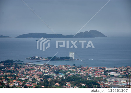 Elevated perspective of Ria de Vigo showcasing its mouth and iconic islands Elevated perspective of Ria de Vigo showcasing its mouth and iconic islands 139261307