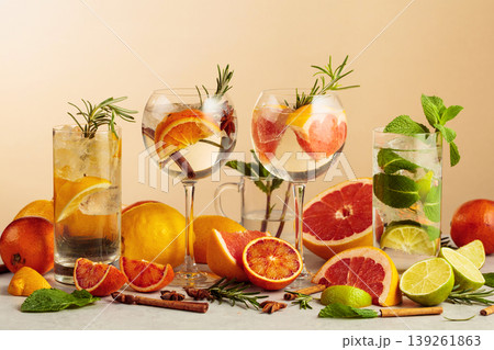 Mojito and various gin and tonic cocktails on a beige background. 139261863