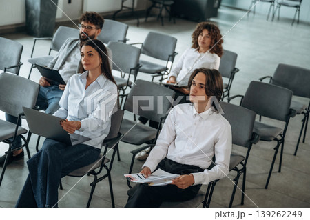 Listening to the presentation. People are sitting on the meeting, business conception Listening to the presentation. People are sitting on the meeting, business conception 139262249