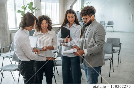 At business meeting. Group of people are working in the office together as a team 139262270