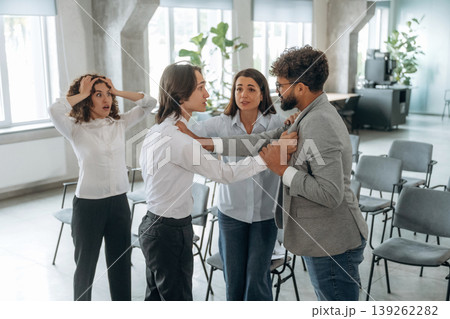 Disagreement, ready to fight. Group of people are working in the office together as a team 139262282