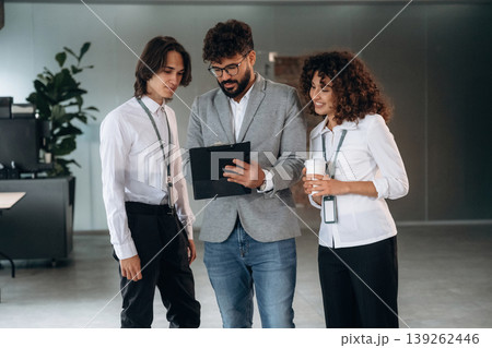 Three people are working together in the modern office 139262446