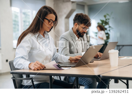 Man and woman are working in the modern office, business conception 139262451