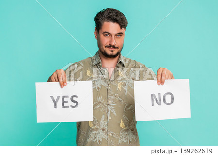 Man holding yes and no signs offering choice decision-making opportunity question propose selection Man holding yes and no signs offering choice decision-making opportunity question propose selection 139262619