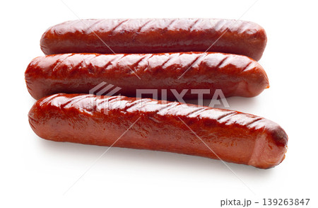 Appetizing fried sausages close-up on a white isolated background Appetizing fried sausages close-up on a white isolated background 139263847