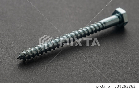 Construction screw close-up on a black background Construction screw close-up on a black background 139263863