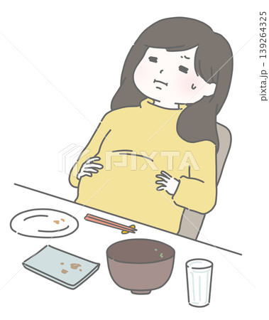 食べ過ぎてお腹が苦しい女性 食べ過ぎてお腹が苦しい女性 139264325