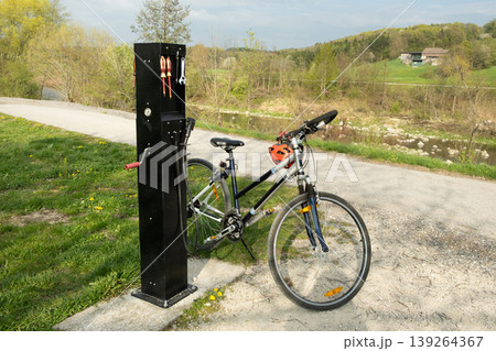 Self-service bike maintenance point in the countryside Self-service bike maintenance point in the countryside 139264367