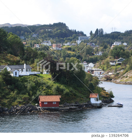 Houses near Bergen seen from the ferry, Norway. Houses near Bergen seen from the ferry, Norway. 139264706