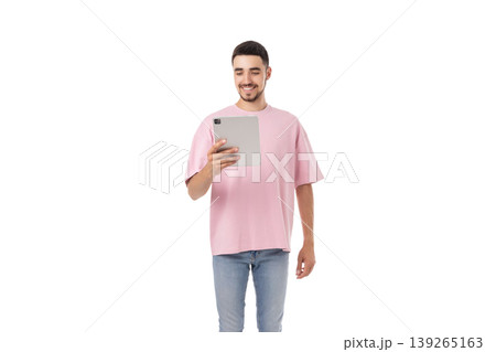 Man interacts with a tablet and smiles while standing, isolated, PNG Man interacts with a tablet and smiles while standing, isolated, PNG 139265163
