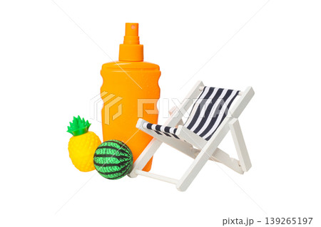 Sunscreen bottle, beach chair, and two small toys Sunscreen bottle, beach chair, and two small toys 139265197