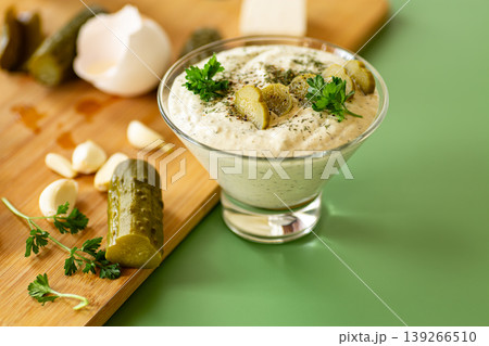 Fresh creamy dressing with garlic cucumber and rustic styling Fresh creamy dressing with garlic cucumber and rustic styling 139266510