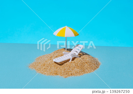 a tiny beach setup on a blue surface 139267250