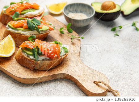 Smoked salmon toast with avocado and cream cheese Smoked salmon toast with avocado and cream cheese 139268910