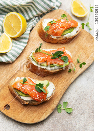 Smoked salmon toast with avocado and cream cheese Smoked salmon toast with avocado and cream cheese 139268913