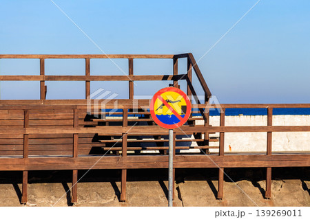 No Diving sign near the wooden pier 139269011