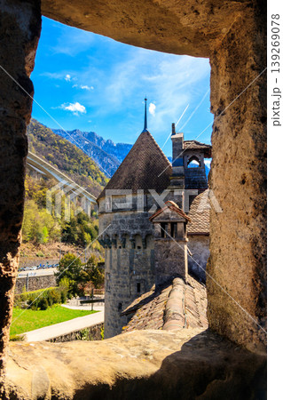 View of Chillon Castle through window hole. Montreux, Switzerland View of Chillon Castle through window hole. Montreux, Switzerland 139269078