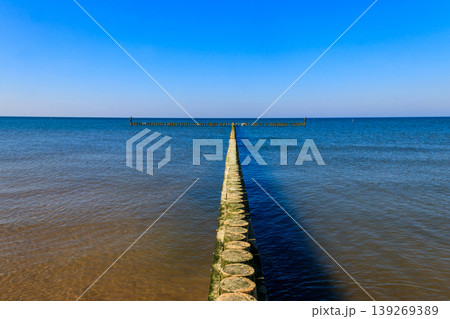 Wooden breakwater in the Baltic sea, Poland Wooden breakwater in the Baltic sea, Poland 139269389