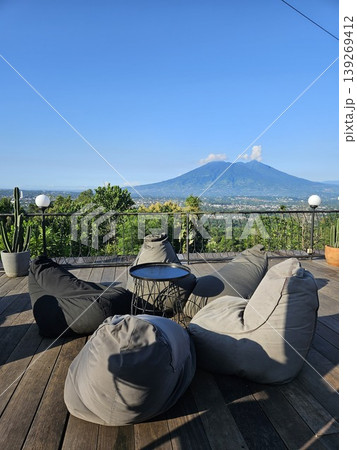 this is soft sofa with a mountain background this is soft sofa with a mountain background 139269412